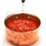 tomato lentil onion soup copper saucepan white napkin food photographer dublin based john jordan photography