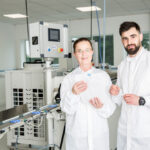 Photo of lab technicians at extrusion machine console, Galway city Ireland Ridgeback Technologies industrial process photography